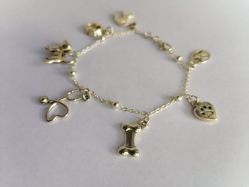 Pulsera dorada charms mascotas huella corazón hueso