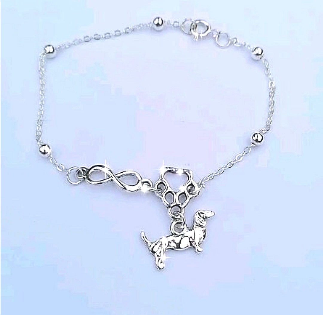 Pulsera infinito patita con dije perrito dachshund