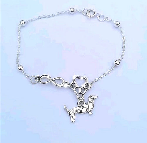 Pulsera infinito patita con dije perrito dachshund