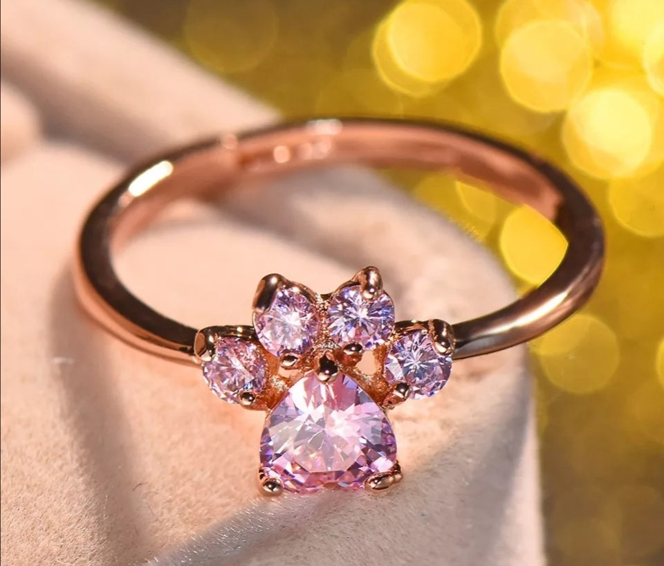 Anillo patita oro rosa con cristales iluminados